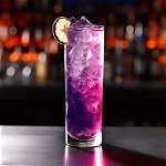 William Wilson the Signature Purple Rain Cocktail Comprises Don Julio Blanco Tequila, Fresh Lemon and Lime Juices, Cranberry Syrup Along with a Lavender Blossom from the Rooftop Garden.